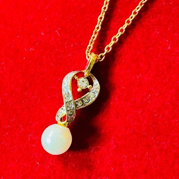 Nina Ricci Jewelry - Nina Ricci Gold and Silver Infinity Necklace